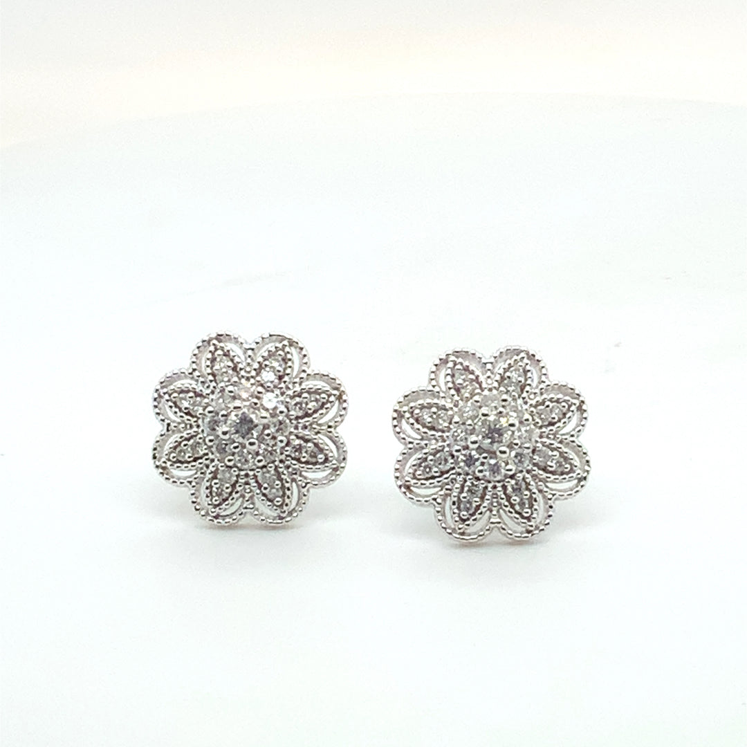 10K White Gold Stud Diamond Earrings 0.62CTW.