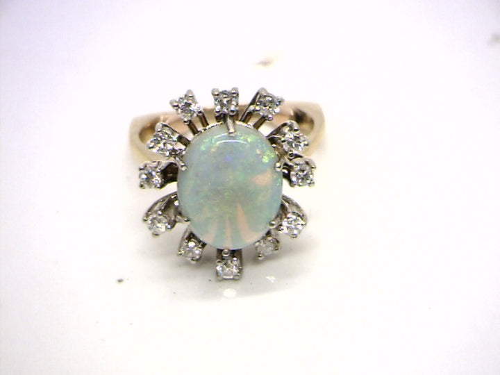 18K Two Tone Gemstone ring CTW.