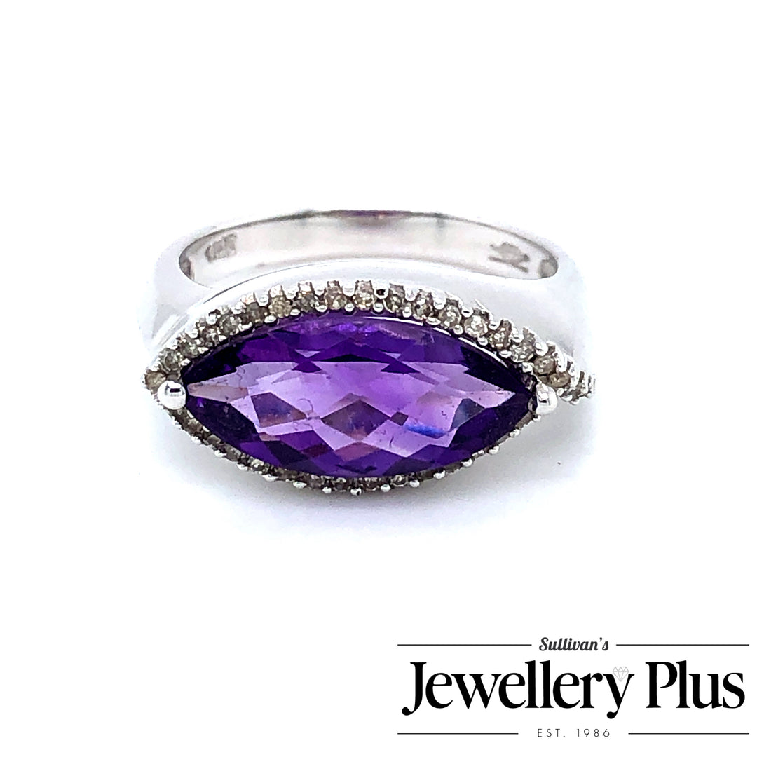 14K White Gold Gemstone ring CTW.